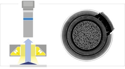 Plastic cap illuminated by a LTLA, revealing the surface texture.
